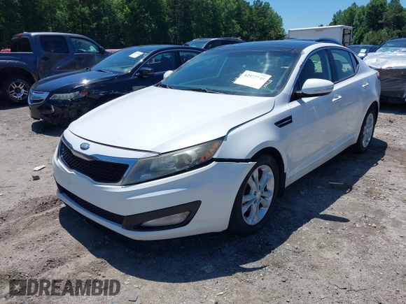 2013 Kia Optima EX with VIN 5XXGN4A7XDG168834, listed as a IAAI auction lot 42515149 with 196,732 mi miles and . Bid and sale history available at DreamBid. Image 2.