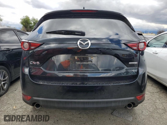 2020 Mazda CX-5 Grand Touring with VIN JM3KFADM0L0786565, listed as a Copart auction lot 48430915 with 60,390 mi miles and Salvage Title. Bid and sale history available at carsss.com. Image 6.