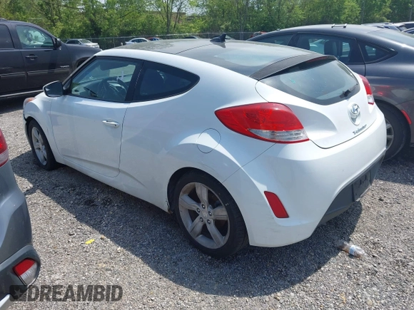 2015 Hyundai Veloster z VIN KMHTC6AD8FU228494, wystawiony jako IAAI lot #42231797 z przebiegiem 111 141 mil mil oraz . Historia ofert i sprzedaży dostępna na DreamBid. Obrazek 3.