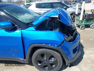 2021 Jeep Compass Altitude with VIN 3C4NJCBB0MT523322, listed as a IAAI auction lot 41989408 with 64,880 mi miles. Bid and sale history available at carsss.com. Image 18.
