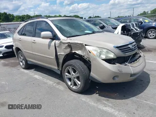 2007 Lexus RX 400h z VIN JTJGW31U472004936, wystawiony jako IAAI lot #42195931 z przebiegiem 181 611 mil mil oraz . Historia ofert i sprzedaży dostępna na DreamBid. Obrazek 1.