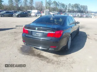 2011 BMW 7 Series 750Li xDrive with VIN WBAKC8C53BC433865, listed as a IAAI auction lot 41823357 with 122,476 mi miles. Bid and sale history available at carsss.com. Image 4.