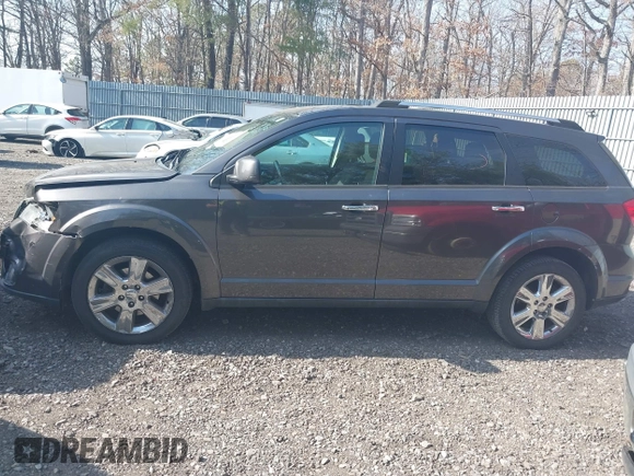 2016 Dodge Journey SXT with VIN 3C4PDDBG3GT118383, listed as a IAAI auction lot 41801212 with 136,068 mi miles and . Bid and sale history available at carsss.com. Image 14.