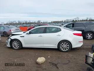 2015 Kia Optima EX with VIN 5XXGN4A73FG438313, listed as a IAAI auction lot 41699954 with 76,584 mi miles. Bid and sale history available at carsss.com. Image 13.