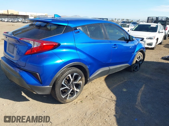 2018 Toyota C-HR XLE z VIN NMTKHMBXXJR007134, wystawiony jako IAAI lot #42004283 z przebiegiem 174 336 mil mil oraz . Historia ofert i sprzedaży dostępna na DreamBid. Obrazek 4.