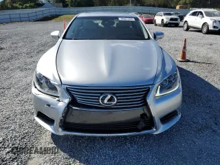 2014 Lexus LS 460 L z VIN JTHGL5EF2E5052609, wystawiony jako Copart lot #76527424 z przebiegiem 104 932 mil mil oraz Szkoda całkowita • Salvage title. Historia ofert i sprzedaży dostępna na DreamBid. Obrazek 5.