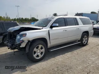 2020 Chevrolet Suburban Premier z VIN 1GNSKJKC0LR164243, wystawiony jako Copart lot #70530624 z przebiegiem Nie podano mil oraz Szkoda całkowita • Salvage title. Historia ofert i sprzedaży dostępna na DreamBid. Obrazek 1.