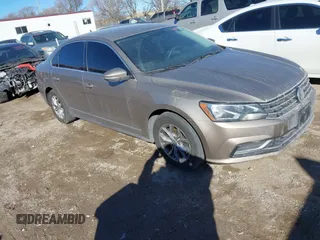 2016 Volkswagen Passat 1.8T S with VIN 1VWAT7A31GC015335, listed as a IAAI auction lot 41682085 with 118,875 mi miles. Bid and sale history available at carsss.com. Image 1.