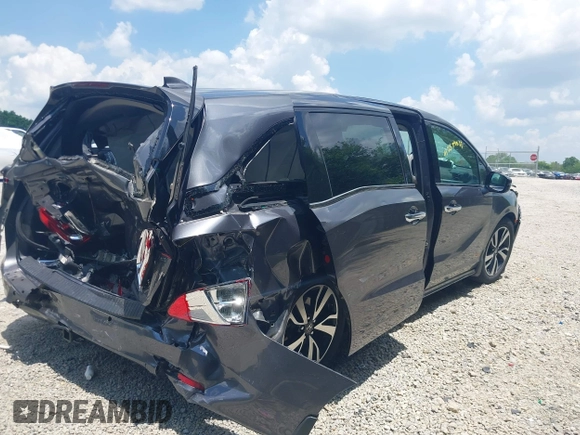 2018 Honda Odyssey Elite with VIN 5FNRL6H95JB087952, listed as a IAAI auction lot 42579817 with 96,577 mi miles and . Bid and sale history available at DreamBid. Image 4.