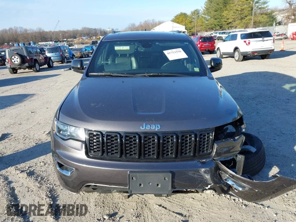 2021 Jeep Grand Cherokee 80th Anniversary z VIN 1C4RJFBG5MC737412, wystawiony jako IAAI lot #41753550 z przebiegiem 54 921 mil mil oraz . Historia ofert i sprzedaży dostępna na DreamBid. Obrazek 12.