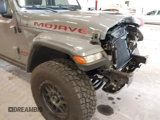 2021 Jeep Gladiator Mojave with VIN 1C6JJTEG1ML596109, listed as a IAAI auction lot 41783913 with 71,112 mi miles and . Bid and sale history available at DreamBid. Image 20.