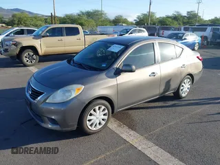 2012 Nissan Versa SL with VIN 3N1CN7AP2CL813868, listed as a IAAI auction lot 41512718 with 88,318 mi miles. Bid and sale history available at carsss.com. Image 2.