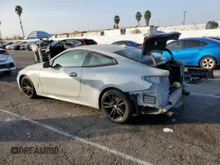 2022 BMW 4 Series 430i xDrive with VIN WBA73AP02NCK63692, listed as a Copart auction lot 84758794 with 21,484 mi miles and Salvage Title. Bid and sale history available at DreamBid. Image 2.