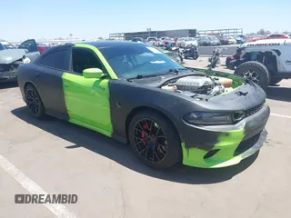 2019 Dodge Charger SRT Hellcat z VIN 2C3CDXL98KH732884, wystawiony jako IAAI lot #42237974 z przebiegiem 42 779 mil mil oraz . Historia ofert i sprzedaży dostępna na DreamBid. Obrazek 1.