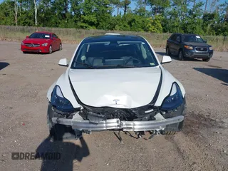 2023 Tesla Model 3 with VIN 5YJ3E1EA9PF557880, listed as a IAAI auction lot 42481413 with 40,582 mi miles and . Bid and sale history available at DreamBid. Image 11.