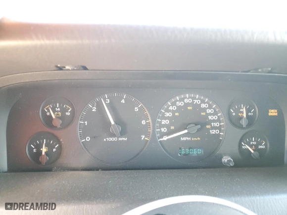 1999 Jeep Grand Cherokee Laredo with VIN 1J4GW58NXXC776438, listed as a Copart auction lot 84412044 with 163,060 mi miles and Salvage Title. Bid and sale history available at carsss.com. Image 9.