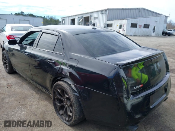 2013 Chrysler 300 C with VIN 2C3CCAKT6DH712441, listed as a IAAI auction lot 41695261 with 182,314 mi miles and . Bid and sale history available at carsss.com. Image 3.