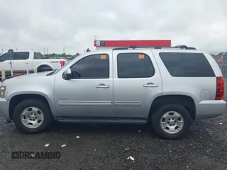 2012 Chevrolet Tahoe LS z VIN 1GNSCAE02CR308972, wystawiony jako IAAI lot #42495520 z przebiegiem 205 295 mil mil oraz . Historia ofert i sprzedaży dostępna na DreamBid. Obrazek 14.
