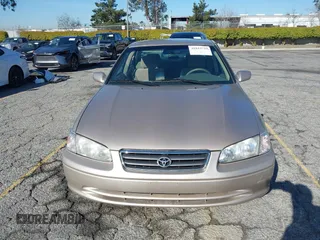 2001 Toyota Camry CE with VIN JT2BG22KX10559757, listed as a IAAI auction lot 41823719 with 72,775 mi miles. Bid and sale history available at carsss.com. Image 12.