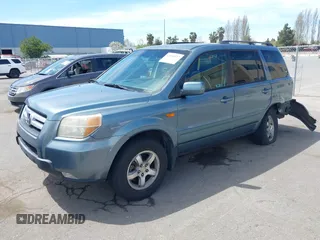 2007 Honda Pilot EX with VIN 2HKYF18447H520522, listed as a IAAI auction lot 42018937 with 128,401 mi miles. Bid and sale history available at carsss.com. Image 17.