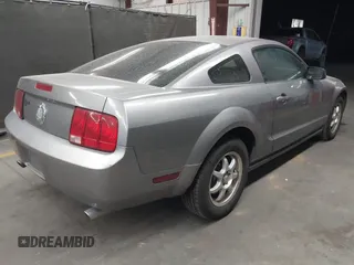 2006 Ford Mustang Standard with VIN 1ZVFT80N965118228, listed as a IAAI auction lot 42024536 with 184,724 mi miles. Bid and sale history available at carsss.com. Image 4.