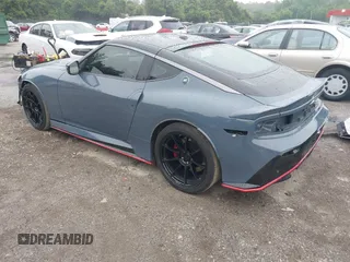 2024 Nissan Z Nismo with VIN JN1BZ4CH9RM360447, listed as a IAAI auction lot 42457597 with 9,723 mi miles and . Bid and sale history available at DreamBid. Image 3.