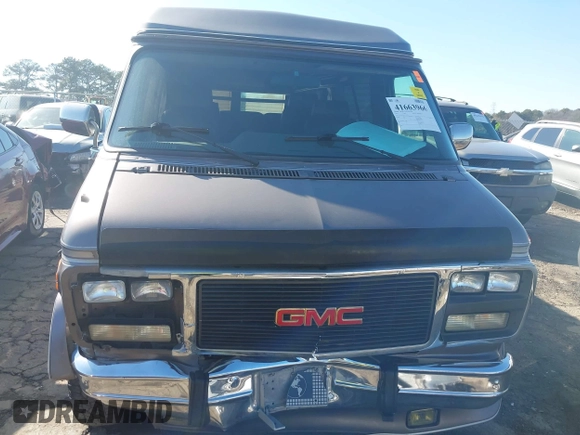 1993 GMC Vandura z VIN 1GDEG25KXPF515274, wystawiony jako IAAI lot #41663966 z przebiegiem 112 288 mil mil oraz . Historia ofert i sprzedaży dostępna na DreamBid. Obrazek 12.