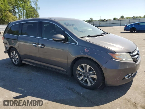 2016 Honda Odyssey Touring Elite with VIN 5FNRL5H91GB088163, listed as a Copart auction lot 50276495 with 197,274 mi miles and Salvage Title. Bid and sale history available at DreamBid. Image 4.