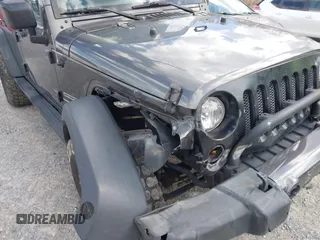 2018 Jeep Wrangler Unlimited Sport S z VIN 1C4HJWDG2JL930461, wystawiony jako IAAI lot #42042644 z przebiegiem 136 530 mil mil oraz . Historia ofert i sprzedaży dostępna na DreamBid. Obrazek 17.