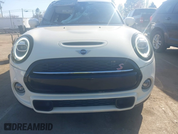 2021 MINI Hardtop 4 Door Cooper S with VIN WMWXU9C00M2P04693, listed as a IAAI auction lot 41785185 with 57,848 mi miles and . Bid and sale history available at DreamBid. Image 12.