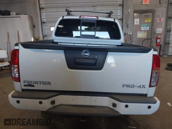 2014 Nissan Frontier SV with VIN 1N6AD0EV4EN736220, listed as a IAAI auction lot 41241823 with 91,789 mi miles and . Bid and sale history available at DreamBid. Image 16.