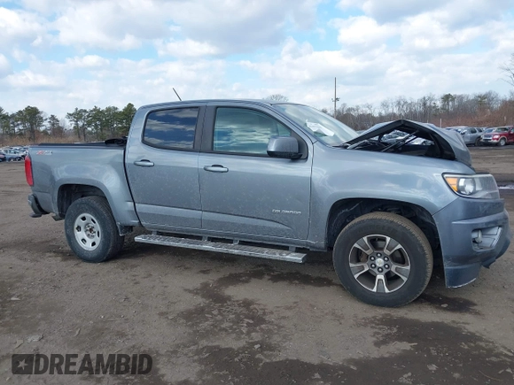 2018 Chevrolet Colorado 4WD Z71 z VIN 1GCGTDENXJ1133572, wystawiony jako IAAI lot #41437941 z przebiegiem 82 254 mil mil oraz . Historia ofert i sprzedaży dostępna na DreamBid. Obrazek 13.