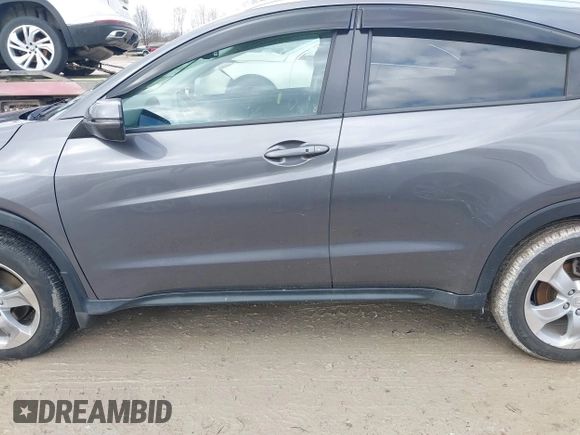 2016 Honda HR-V EX-L w/Navi with VIN 3CZRU6H71GM700451, listed as a IAAI auction lot 41675235 with 199,313 mi miles. Bid and sale history available at carsss.com. Image 15.
