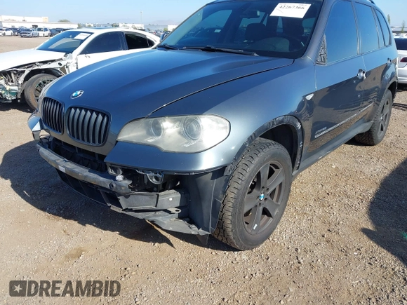 2013 BMW X5 xDrive35i z VIN 5UXZV4C56D0G57030, wystawiony jako IAAI lot #42267366 z przebiegiem 174 381 mil mil oraz . Historia ofert i sprzedaży dostępna na DreamBid. Obrazek 6.