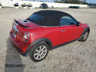 2013 MINI Roadster S z VIN WMWSY3C56DT593875, wystawiony jako Copart lot #74982124 z przebiegiem 64 622 mil mil oraz Szkody całkowita. Historia ofert i sprzedaży dostępna na DreamBid. Obrazek 3.