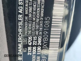2000 Mercedes-Benz E-Class with VIN WDBJF70JXYB091085, listed as a Copart auction lot 77136484 with 185,429 mi miles and Salvage Title. Bid and sale history available at carsss.com. Image 13.