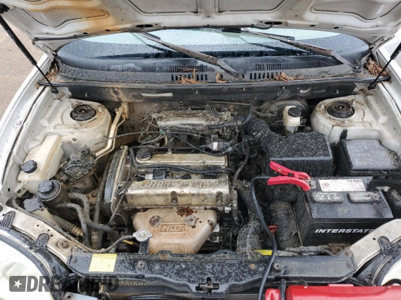 2004 Hyundai Santa Fe z VIN KM8SB12B84U825804, wystawiony jako Copart lot #51107585 z przebiegiem 229 942 mil mil oraz Szkoda całkowita • Salvage title. Historia ofert i sprzedaży dostępna na DreamBid. Obrazek 12.