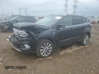 2018 Ford Escape Titanium z VIN 1FMCU9J98JUC67847, wystawiony jako Copart lot #60909245 z przebiegiem 131 262 mil mil oraz Szkoda całkowita • Salvage title. Historia ofert i sprzedaży dostępna na DreamBid. Obrazek 1.