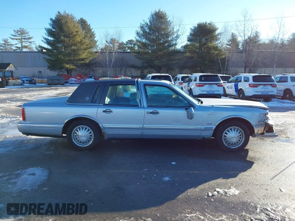 1997 Lincoln Town Car Cartier with VIN 1LNLM83W9VY661126, listed as a IAAI auction lot 41456847 with 160,710 mi miles and . Bid and sale history available at DreamBid. Image 13.