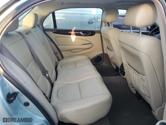 2005 Jaguar XJ with VIN SAJWA79C05SG37189, listed as a Copart auction lot 76804104 with 0 mi miles and Salvage Title. Bid and sale history available at carsss.com. Image 10.
