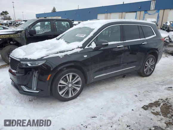 2021 Cadillac XT6 Premium Luxury with VIN 1GYKPDRS3MZ165049, listed as a Copart auction lot 45456145 with 57,112 mi miles and Salvage title. Bid and sale history available at DreamBid. Image 1.