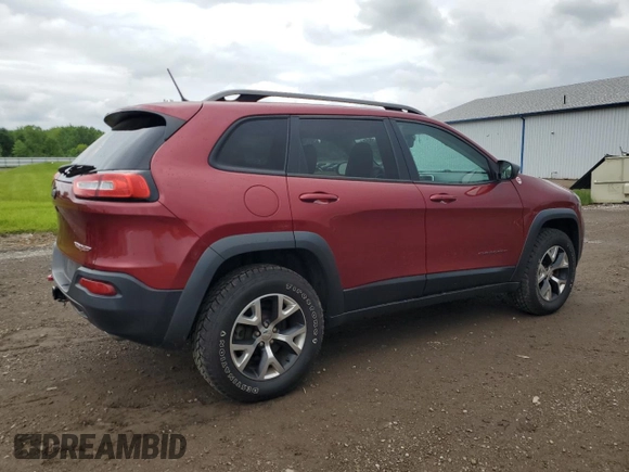 2014 Jeep Cherokee Trailhawk z VIN 1C4PJMBS2EW130125, wystawiony jako Copart lot #57830635 z przebiegiem 117 811 mil mil oraz Szkody całkowita. Historia ofert i sprzedaży dostępna na DreamBid. Obrazek 3.
