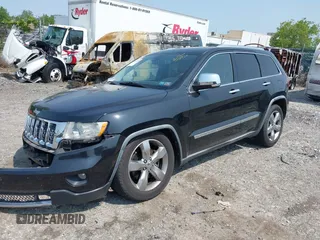 2011 Jeep Grand Cherokee Overland with VIN 1J4RR6GT3BC574037, listed as a IAAI auction lot 42411532 with 158,765 mi miles and . Bid and sale history available at DreamBid. Image 18.