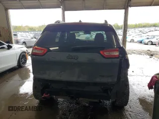 2014 Jeep Cherokee Trailhawk z VIN 1C4PJMBB0EW309277, wystawiony jako Copart lot #52370565 z przebiegiem 148 924 mil mil oraz Czysty tytuł • Clean title. Historia ofert i sprzedaży dostępna na DreamBid. Obrazek 6.