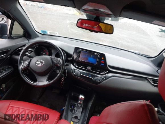 2018 Toyota C-HR XLE with VIN JTNKHMBX6J1000904, listed as a IAAI auction lot 42513117 with 77,192 mi miles and . Bid and sale history available at DreamBid. Image 5.