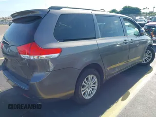 2011 Toyota Sienna XLE AAS with VIN 5TDYK3DC9BS117594, listed as a IAAI auction lot 42553026 with 156,808 mi miles and . Bid and sale history available at DreamBid. Image 4.