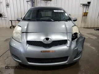 2009 Toyota Yaris with VIN JTDKT903X95231860, listed as a Copart auction lot 51908185 with 135,701 mi miles and Salvage Title. Bid and sale history available at carsss.com. Image 5.