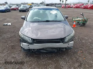 2014 Honda Civic LX z VIN 19XFB2F51EE256181, wystawiony jako IAAI lot #41707181 z przebiegiem 153 859 mil mil oraz . Historia ofert i sprzedaży dostępna na DreamBid. Obrazek 12.
