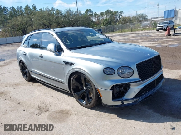 2022 Bentley Bentayga V8 z VIN SJAAM2ZV9NC011752, wystawiony jako IAAI lot #41265000 z przebiegiem Nie podano mil oraz . Historia ofert i sprzedaży dostępna na DreamBid. Obrazek 1.