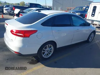 2015 Ford Focus SE with VIN 1FADP3F25FL282916, listed as a IAAI auction lot 42099759 with 152,445 mi miles. Bid and sale history available at carsss.com. Image 4.